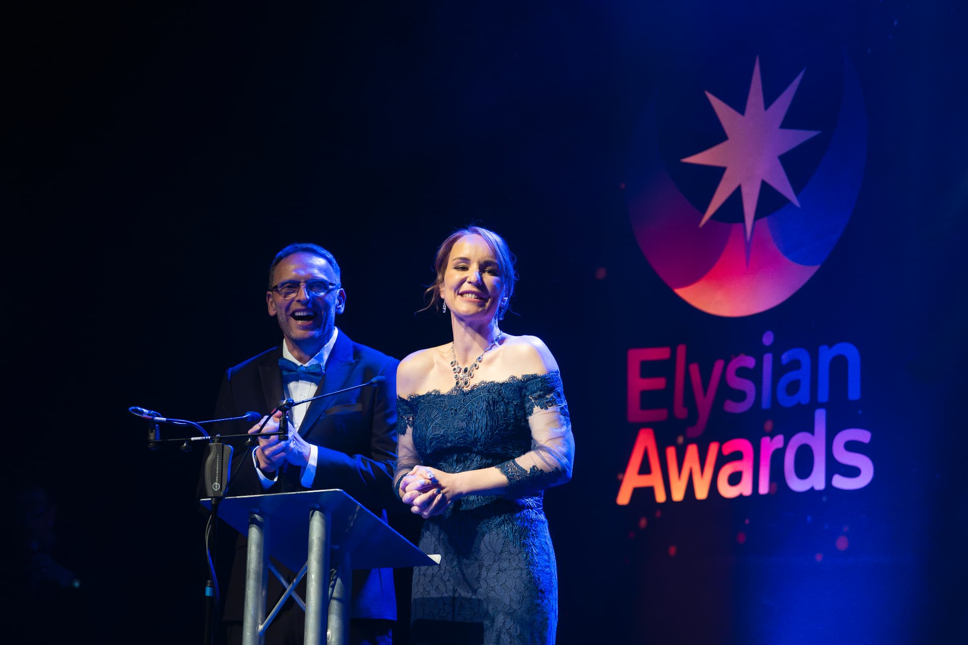 Awards presenters on stage